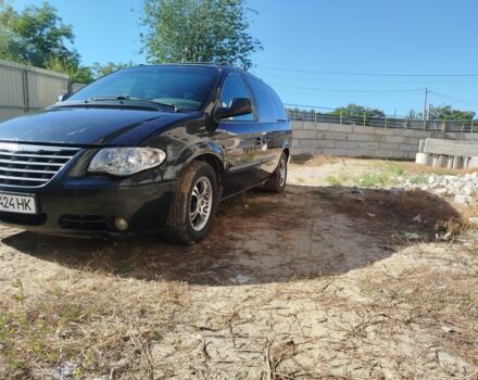 Черный Додж Гранд Караван, объемом двигателя 2.5 л и пробегом 321 тыс. км за 3300 $, фото 1 на Automoto.ua