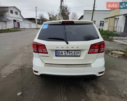 Белый Додж Джорни, объемом двигателя 2.36 л и пробегом 229 тыс. км за 10450 $, фото 1 на Automoto.ua