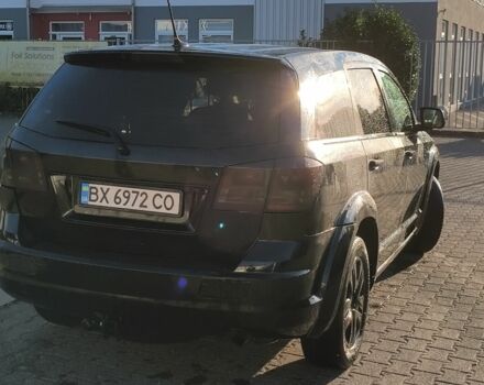 Черный Додж Джорни, объемом двигателя 2.4 л и пробегом 274 тыс. км за 8466 $, фото 1 на Automoto.ua