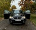 Черный Додж Джорни, объемом двигателя 3.6 л и пробегом 151 тыс. км за 12900 $, фото 1 на Automoto.ua