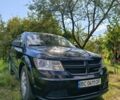 Черный Додж Джорни, объемом двигателя 2.4 л и пробегом 300 тыс. км за 9000 $, фото 1 на Automoto.ua