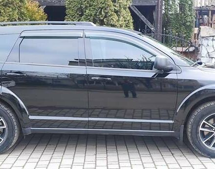 Черный Додж Джорни, объемом двигателя 2.36 л и пробегом 69 тыс. км за 12700 $, фото 2 на Automoto.ua