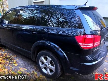 Черный Додж Джорни, объемом двигателя 2.4 л и пробегом 291 тыс. км за 9150 $, фото 1 на Automoto.ua