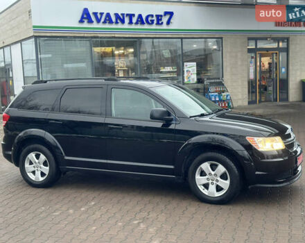 Черный Додж Джорни, объемом двигателя 2.4 л и пробегом 203 тыс. км за 11750 $, фото 1 на Automoto.ua