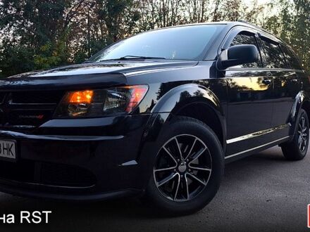 Черный Додж Джорни, объемом двигателя 2.4 л и пробегом 153 тыс. км за 11900 $, фото 1 на Automoto.ua