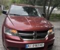 Красный Додж Джорни, объемом двигателя 2.4 л и пробегом 235 тыс. км за 9500 $, фото 1 на Automoto.ua