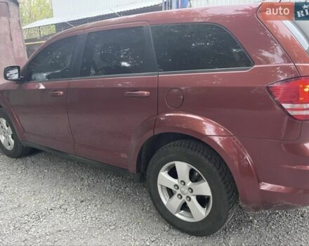Красный Додж Джорни, объемом двигателя 2.4 л и пробегом 235 тыс. км за 9500 $, фото 3 на Automoto.ua