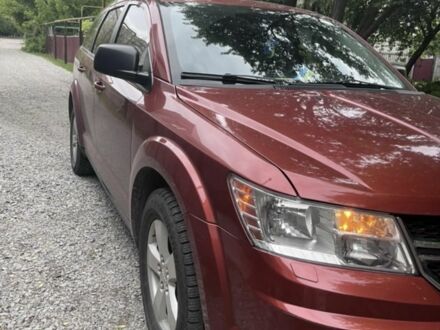 Красный Додж Джорни, объемом двигателя 2.4 л и пробегом 235 тыс. км за 9500 $, фото 1 на Automoto.ua