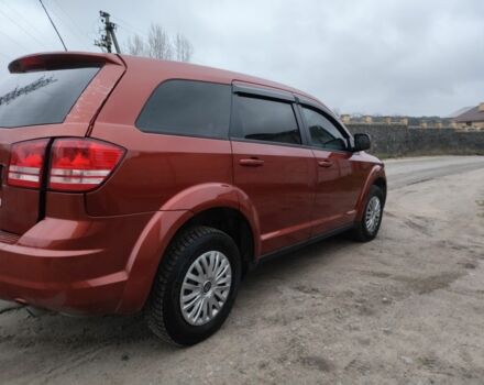 Помаранчевий Додж Джорні, об'ємом двигуна 2.4 л та пробігом 140 тис. км за 5700 $, фото 1 на Automoto.ua