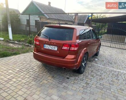 Помаранчевий Додж Джорні, об'ємом двигуна 2.36 л та пробігом 205 тис. км за 8500 $, фото 3 на Automoto.ua