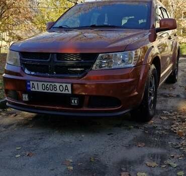 Оранжевый Додж Джорни, объемом двигателя 2.4 л и пробегом 279 тыс. км за 9500 $, фото 1 на Automoto.ua