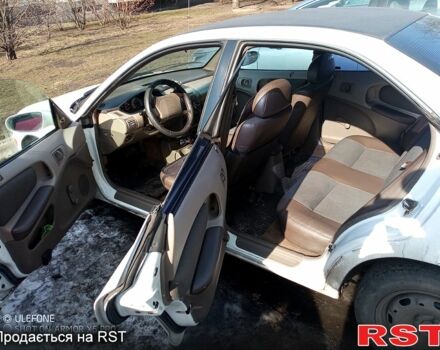 Белый Додж Неон, объемом двигателя 2 л и пробегом 404 тыс. км за 2000 $, фото 10 на Automoto.ua