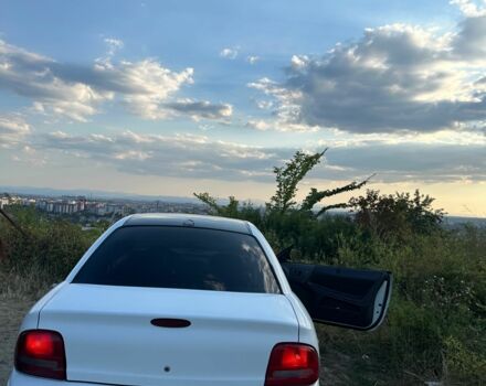 Білий Додж Neon, об'ємом двигуна 2 л та пробігом 400 тис. км за 1701 $, фото 1 на Automoto.ua