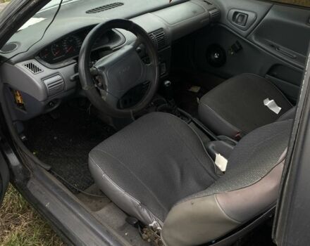 Черный Додж Неон, объемом двигателя 2 л и пробегом 250 тыс. км за 1250 $, фото 4 на Automoto.ua