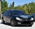 Чорний Додж Neon, об'ємом двигуна 2 л та пробігом 297 тис. км за 3100 $, фото 1 на Automoto.ua