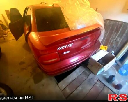 Красный Додж Неон, объемом двигателя 2 л и пробегом 300 тыс. км за 900 $, фото 3 на Automoto.ua