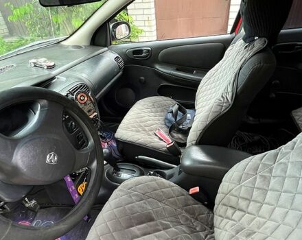 Красный Додж Неон, объемом двигателя 2 л и пробегом 120 тыс. км за 3300 $, фото 7 на Automoto.ua