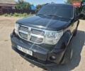 Черный Додж Нитро, объемом двигателя 3.7 л и пробегом 235 тыс. км за 11500 $, фото 1 на Automoto.ua