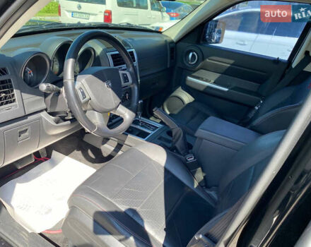 Черный Додж Нитро, объемом двигателя 4 л и пробегом 129 тыс. км за 8900 $, фото 8 на Automoto.ua
