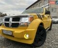 Желтый Додж Нитро, объемом двигателя 4 л и пробегом 218 тыс. км за 9900 $, фото 1 на Automoto.ua