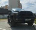 Черный Додж РАМ, объемом двигателя 5.7 л и пробегом 220 тыс. км за 10000 $, фото 1 на Automoto.ua