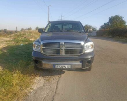 Черный Додж РАМ, объемом двигателя 5.7 л и пробегом 158 тыс. км за 9800 $, фото 1 на Automoto.ua