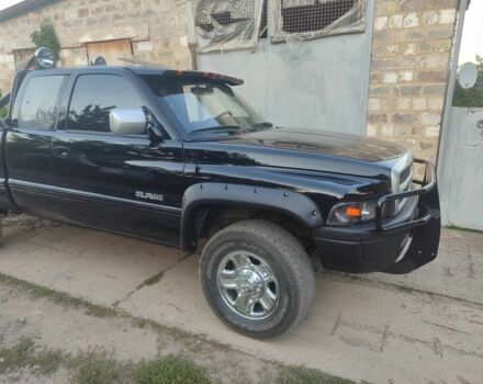 Черный Додж РАМ, объемом двигателя 6 л и пробегом 700 тыс. км за 7000 $, фото 1 на Automoto.ua