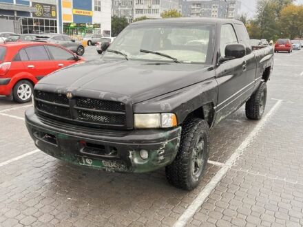 Чорний Додж RAM, об'ємом двигуна 5.2 л та пробігом 320 тис. км за 2050 $, фото 1 на Automoto.ua