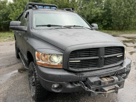 Чорний Додж RAM, об'ємом двигуна 5.9 л та пробігом 380 тис. км за 9100 $, фото 1 на Automoto.ua