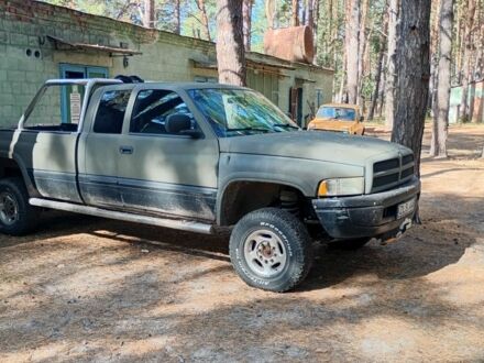 Зелений Додж RAM, об'ємом двигуна 6 л та пробігом 300 тис. км за 9837 $, фото 1 на Automoto.ua