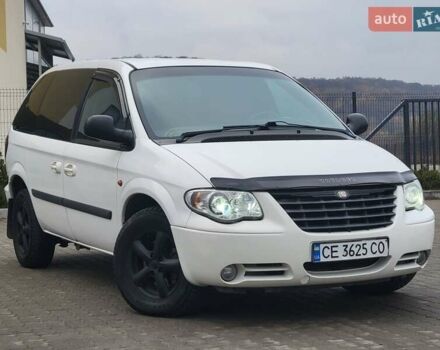 Белый Додж Рам Ван, объемом двигателя 2.5 л и пробегом 201 тыс. км за 4999 $, фото 1 на Automoto.ua