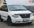Белый Додж Рам Ван, объемом двигателя 2.5 л и пробегом 201 тыс. км за 4999 $, фото 3 на Automoto.ua