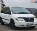 Белый Додж Рам Ван, объемом двигателя 2.5 л и пробегом 201 тыс. км за 4999 $, фото 1 на Automoto.ua