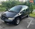 Черный Додж Рам Ван, объемом двигателя 2.5 л и пробегом 477 тыс. км за 3500 $, фото 1 на Automoto.ua