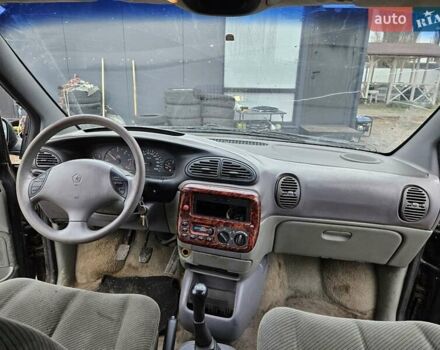 Черный Додж Рам Ван, объемом двигателя 2.5 л и пробегом 127 тыс. км за 2450 $, фото 10 на Automoto.ua