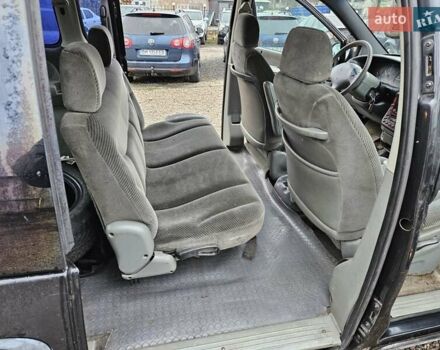 Черный Додж Рам Ван, объемом двигателя 2.5 л и пробегом 127 тыс. км за 2450 $, фото 12 на Automoto.ua