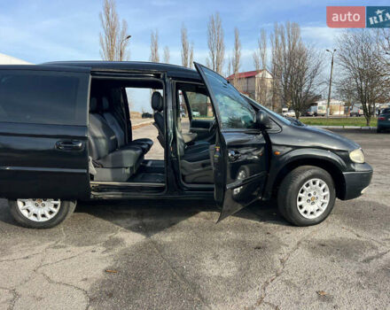 Черный Додж Рам Ван, объемом двигателя 2.5 л и пробегом 200 тыс. км за 2999 $, фото 12 на Automoto.ua