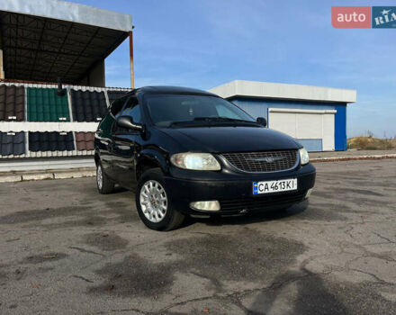 Черный Додж Рам Ван, объемом двигателя 2.5 л и пробегом 200 тыс. км за 2999 $, фото 23 на Automoto.ua