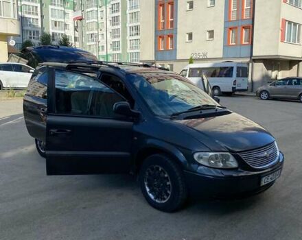 Черный Додж Рам Ван, объемом двигателя 2.5 л и пробегом 435 тыс. км за 3800 $, фото 4 на Automoto.ua