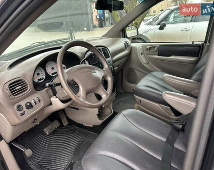 Черный Додж Рам Ван, объемом двигателя 2.5 л и пробегом 200 тыс. км за 2999 $, фото 1 на Automoto.ua