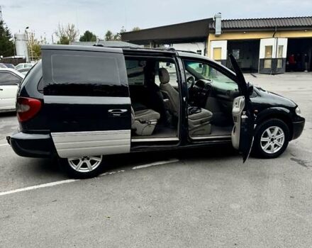 Черный Додж Рам Ван, объемом двигателя 2.5 л и пробегом 225 тыс. км за 5600 $, фото 15 на Automoto.ua