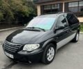 Черный Додж Рам Ван, объемом двигателя 2.5 л и пробегом 225 тыс. км за 5600 $, фото 1 на Automoto.ua