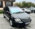 Черный Додж Рам Ван, объемом двигателя 2.5 л и пробегом 225 тыс. км за 5600 $, фото 1 на Automoto.ua