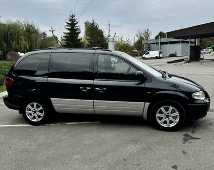 Черный Додж Рам Ван, объемом двигателя 2.5 л и пробегом 225 тыс. км за 5600 $, фото 5 на Automoto.ua