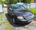 Черный Додж Рам Ван, объемом двигателя 2.5 л и пробегом 314 тыс. км за 2100 $, фото 1 на Automoto.ua
