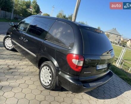 Черный Додж Рам Ван, объемом двигателя 2.5 л и пробегом 297 тыс. км за 3950 $, фото 1 на Automoto.ua