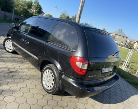 Черный Додж Рам Ван, объемом двигателя 2.5 л и пробегом 297 тыс. км за 3950 $, фото 2 на Automoto.ua