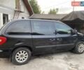 Черный Додж Рам Ван, объемом двигателя 2.5 л и пробегом 290 тыс. км за 4800 $, фото 1 на Automoto.ua
