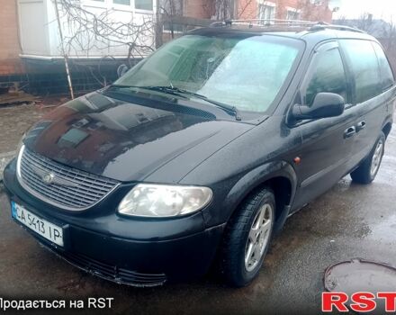 Черный Додж Рам Ван, объемом двигателя 2.5 л и пробегом 300 тыс. км за 4400 $, фото 1 на Automoto.ua