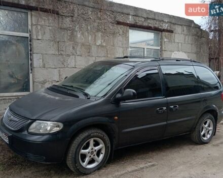 Черный Додж Рам Ван, объемом двигателя 2.5 л и пробегом 500 тыс. км за 3700 $, фото 1 на Automoto.ua